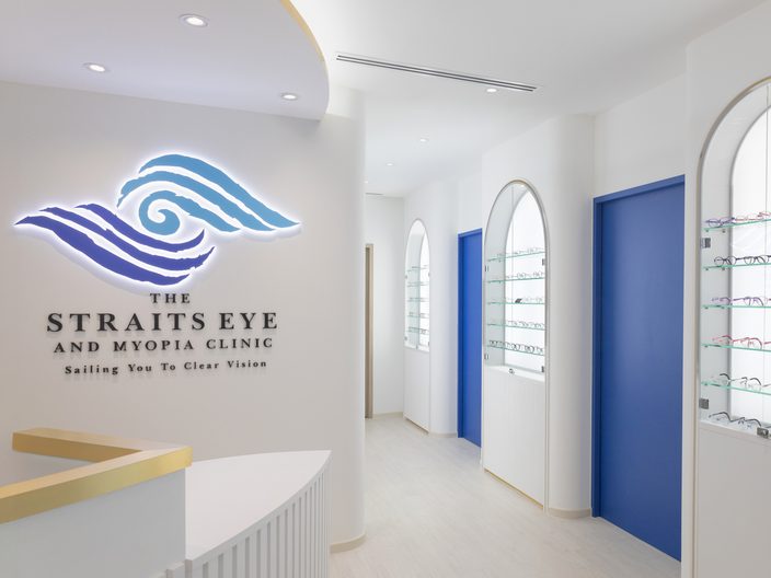 The reception counter and spectacle frame displays at The Straits Eye and Myopia Clinic.