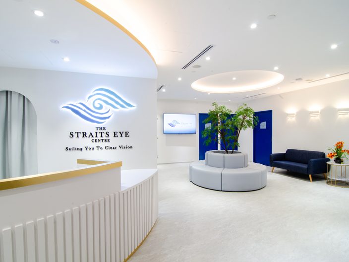 The reception counter and waiting area at The Straits Eye Centre @ Camden.