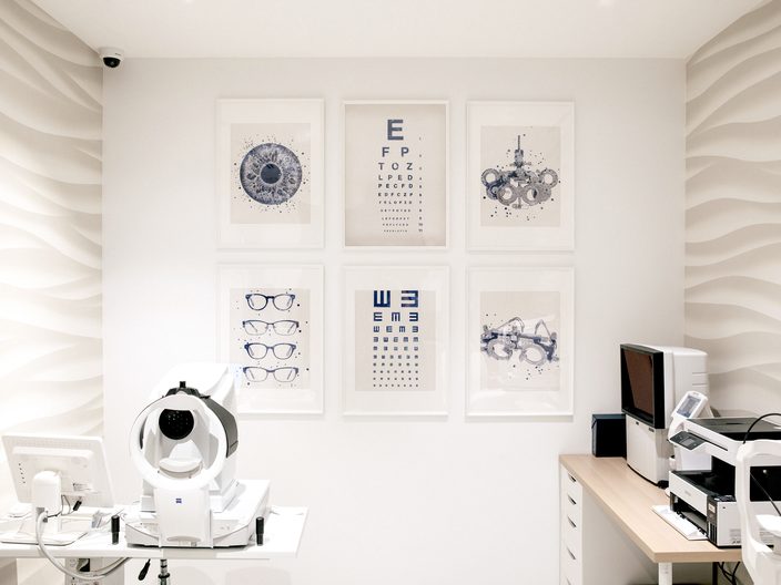 An examination room set up for eye measurements and vision testing.